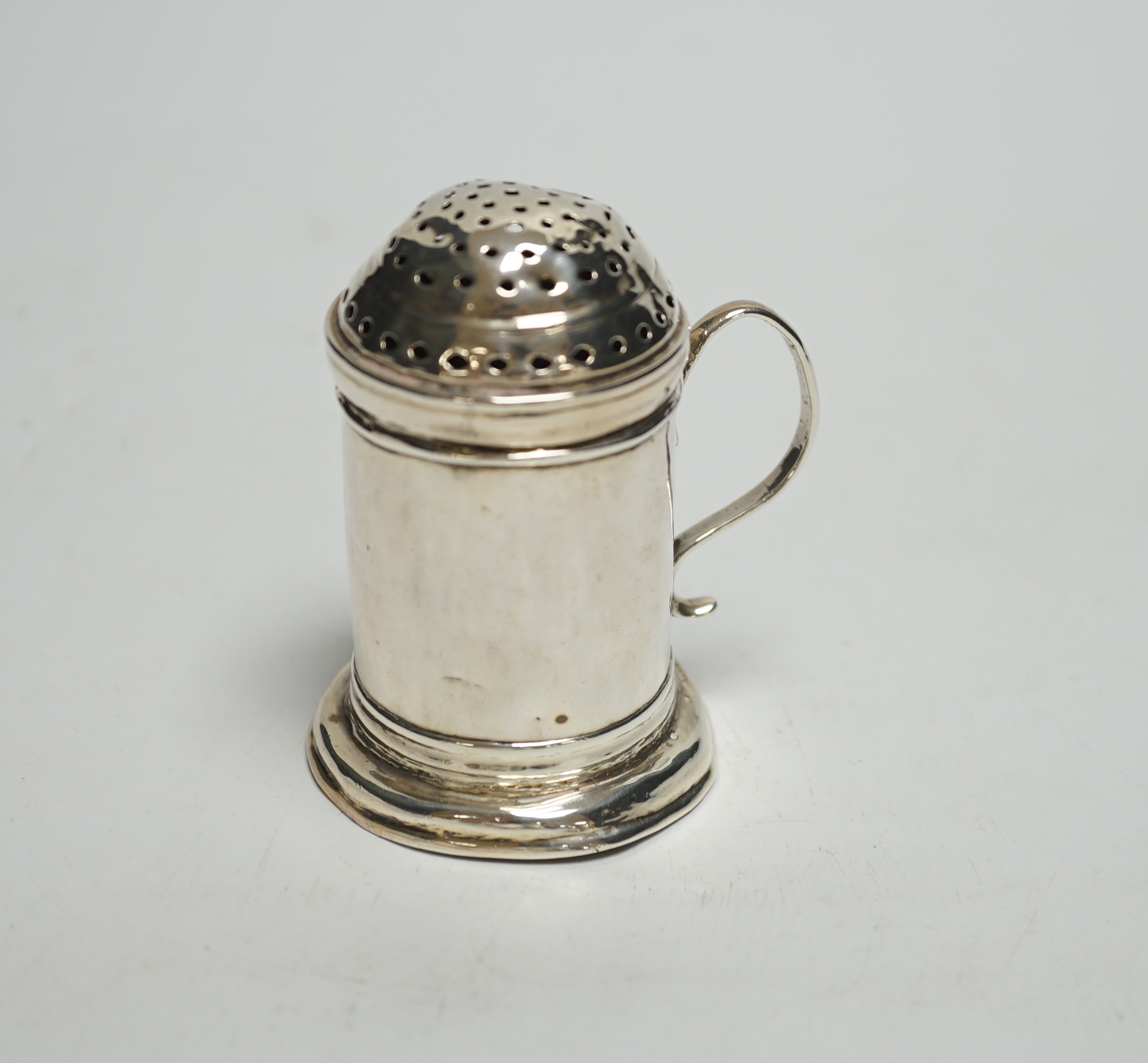 A George I Britannia standard silver kitchen pepper, William Fleming, London, 1718, 67mm, 56 grams.